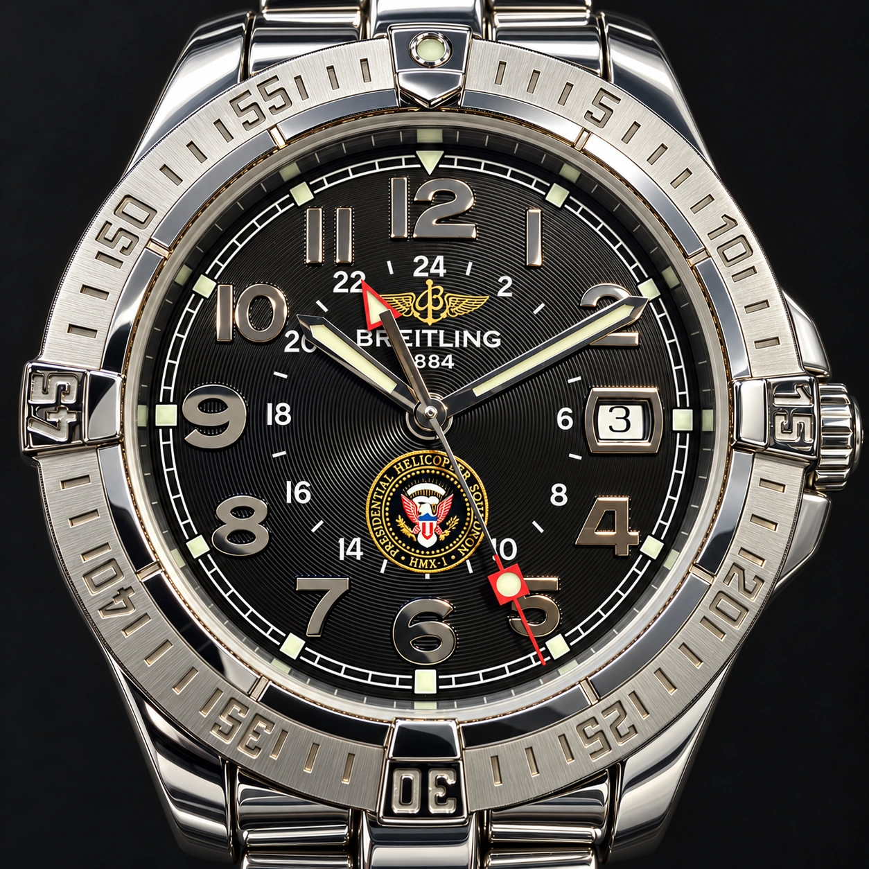 Close-up of the black HMX-1 Breitling dial, polished steel bezel and Presidential Helicopter Squadron insignia
